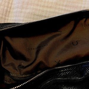 Longchamp black tote or purse.